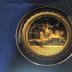 ceramic plate black with gilt design
