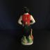 Cretan liquor bottle shaped like a man with a bouzouki