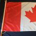 flags of Canada and Greece on poles