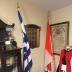 flags of Canada and Greece on poles