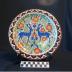 ceramic plate  from Rhodes with hand painted designs and gold edging
