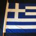 flags of Canada and Greece on poles