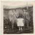 photograph of two young men and a young girl